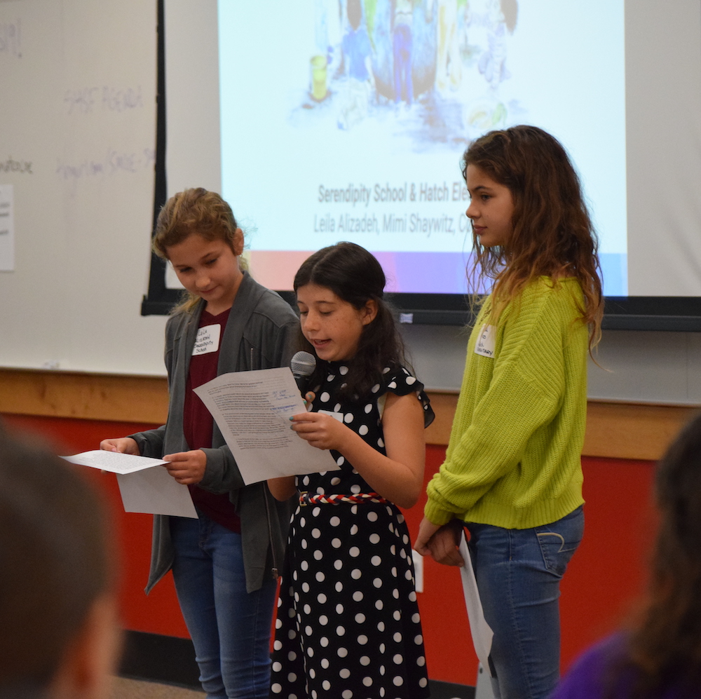 Students present their projects to attendees.